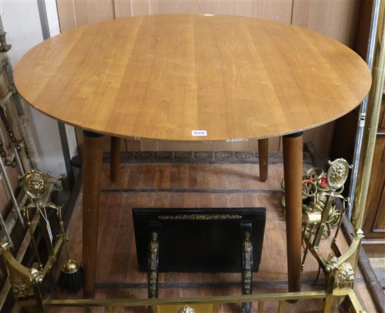 A circular dining table W.110cm